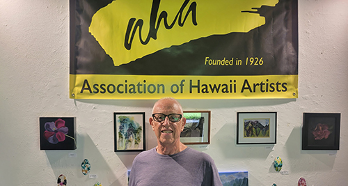 Frank Oliva standing in front of his art displayed at the 106th Annual Miniatures Show - Hoomaluhia Botanical Garden - Nov 1 - 30, 2022
