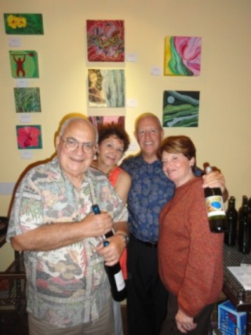 4 friends celebrating at Oeneo Winemaking in Kailua, Hawaii